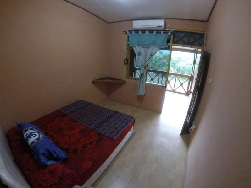 Supersuck Hotel Maluk Екстериор снимка